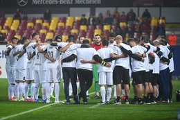 The players wore a black mourning squad and a white shirt with the words 