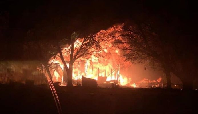 The massive fire at the home in question in Alford, Texas.