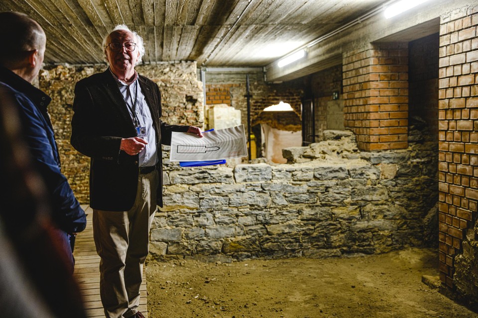 Armand Storck directs visitors through the crypt and the archaeological site below the church. 