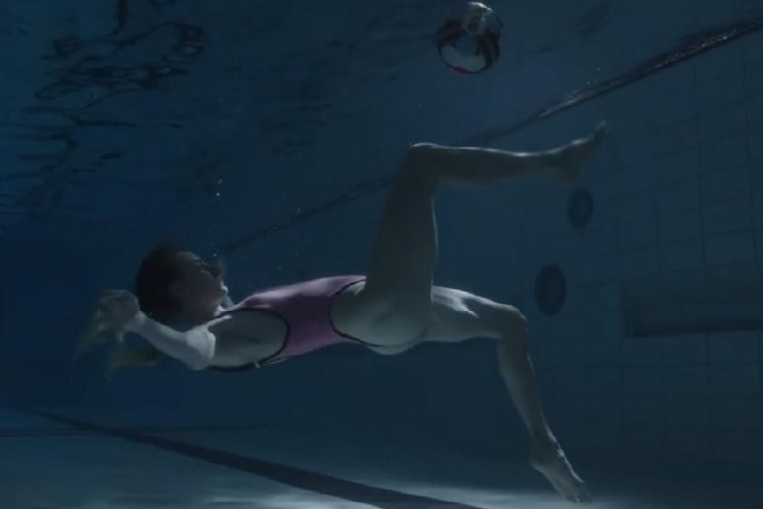 With Underwater Bike Kick (and "Dare to Jump"): Tessa Wullaert stars in GRLPWR swimwear video
