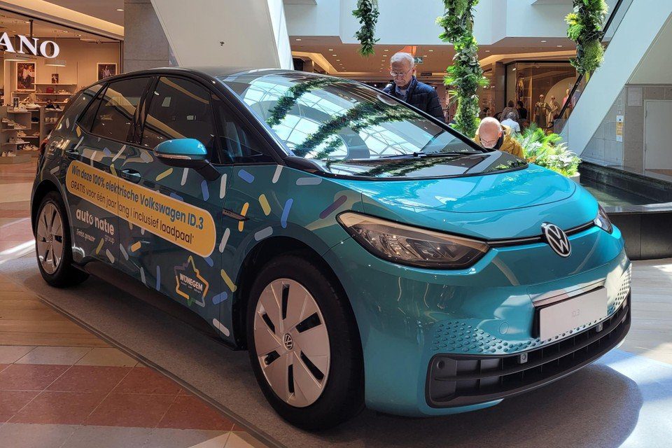 The winner of the competition can ride with this Volkswagen electric car for one year. 