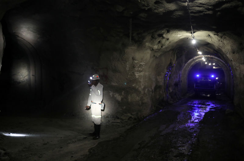 A mine worker is seen under ground at Cullinan mine, near Pretoria