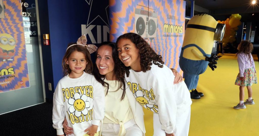 in the picture.  Anne Van Elsen takes her adorable daughters to the Minions premiere |  BV
