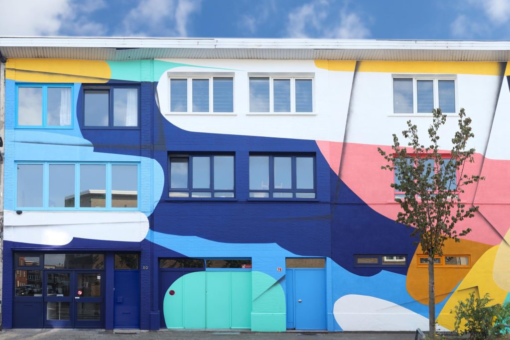 Cocom transforms the former parish center of 1,500 square meters into The Butterfly Effect: art studios, music studios and exhibition space under one roof (Borgerhout)