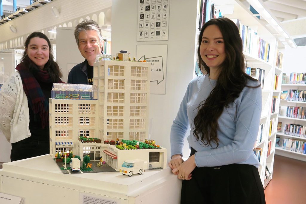 Dirk, Laura, and Yanaika Denuel Build a Sustainable Village in a Visionary Library (Schoten)